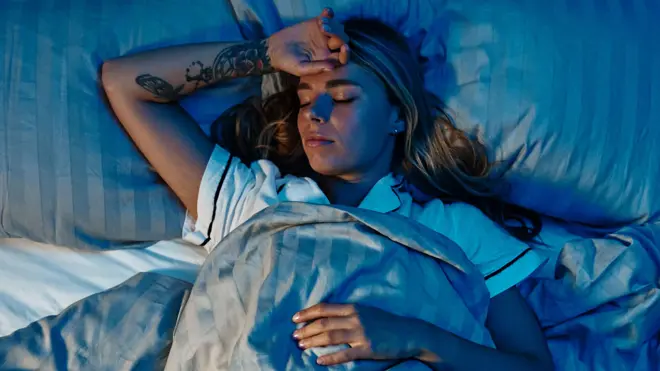 Young woman trying to get to sleep