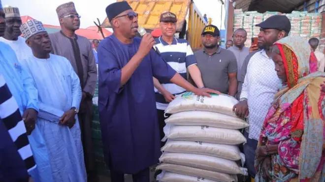 Borno Govnor dey stand near back of food