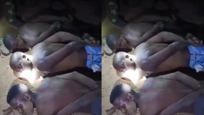 Àwọn ọkùnrin mẹ́ta tó wà nílẹ̀, tí wọ́n taná sí ojú wọn