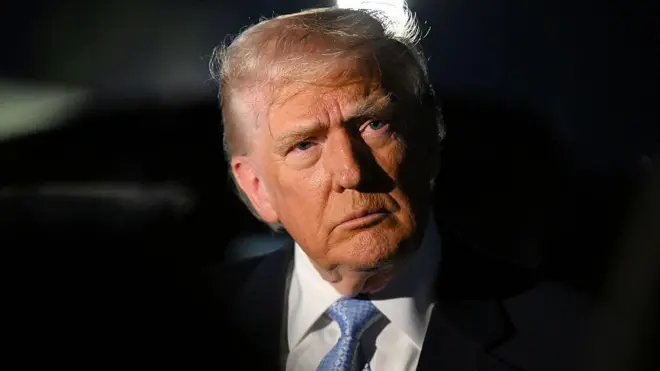 Donald Trump stares straight ahead