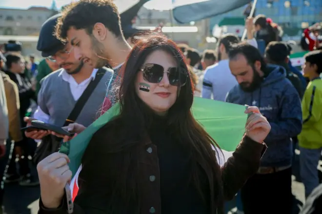 مواطنة سورية في دمشق في 13 ديسمبر/ كانون الأول 2024.