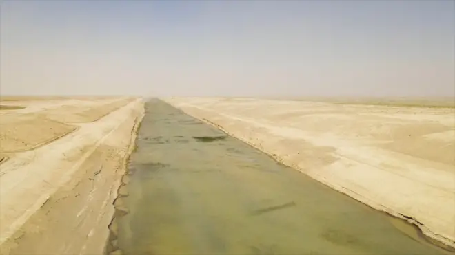 An aerial image of the canal which stretches off towards the horizon