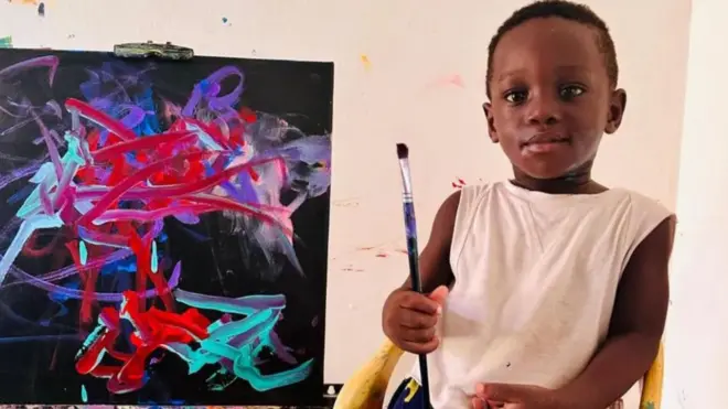 Ace Liam and one of im paintings