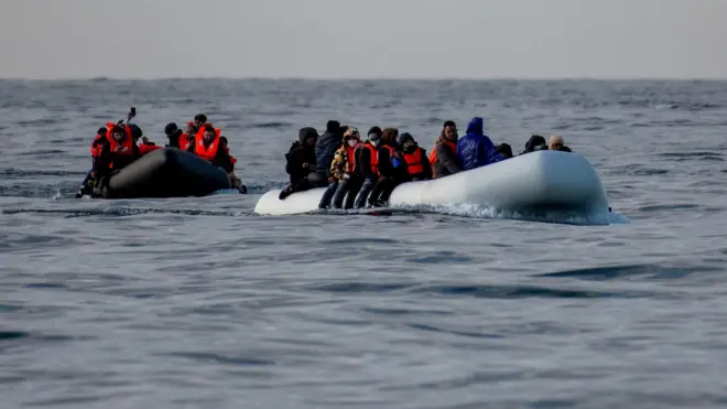 Two inflatable dinghies dey carry migrants wey make dia way towards England for di English Channel