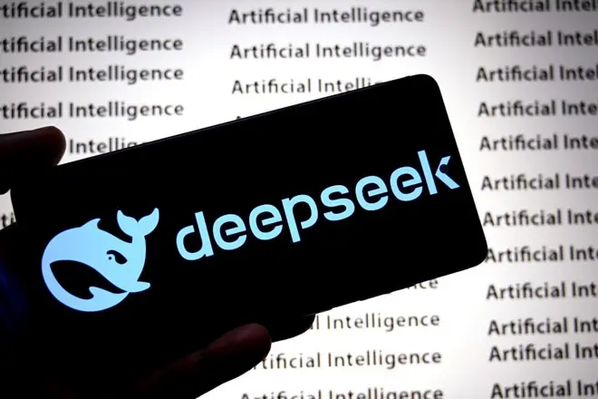 In this photo illustration, the DeepSeek logo is displayed... INDIA - 2025/06/30: In this photo illustration, the DeepSeek logo is displayed on a smartphone with the words 'Artificial Intelligence' visible in the background. (Photo Illustration by Avishek Das/SOPA Images/LightRocket via Getty Images)