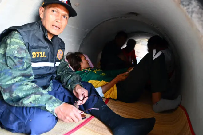 Mandatory Credit: Photo by KAIKUNGWON DUANJUMROON/EPA/Shutterstock (16044154b)
Thai villagers take shelter under a concrete bunker following clashes between Thai and Cambodian troops in Phanom Dong Rak district, Surin province, Thailand, 08 December 2025. The Royal Thai Army has reported a Thai soldier was killed and other eight wounded in the multiple border area clashes between Thai and Cambodian troops after Cambodian troops attacked in the Phu Pha Lek hill of Phlan Hin Paet Kon area in Kantharalak district, Si Sa Ket province that prompted the evacuation of residents in four northeastern provinces bordering Cambodia, according to Thai Army spokesman Major General Winthai Suvaree.
Villagers evacuate following Thai and Cambodian troops clashes over the border dispute, Dong Rak, Thailand - 08 Dec 2025