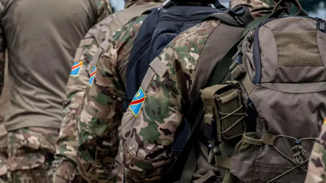 Democratic Republic of Congo Republican Guard soldiers walk in the streets of Kinshasa.