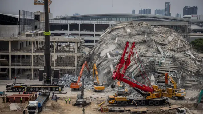 Thai search and rescue teams work to recover victims of the construction building collapse on April 02, 2025 in Bangkok, Thailand. Rescue efforts are ongoing at the collapsed State Audit Office building in Bangkok's Chatuchak district