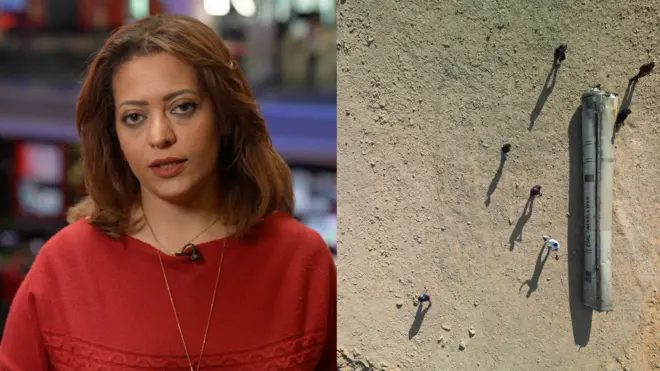 الصحفية في بي بي سي إلى جانب صورة لأحد الصواريخ التي أطلقتها إيران بعد سقوطها في إسرائيل