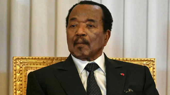 Paul Biya looking at di camera