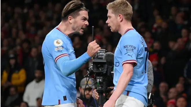 Man City players celebrate