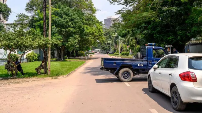 The Congolese Republican Guard and police block a road around the scene of an attempted Coup in Kinshasa on May 19, 2024.