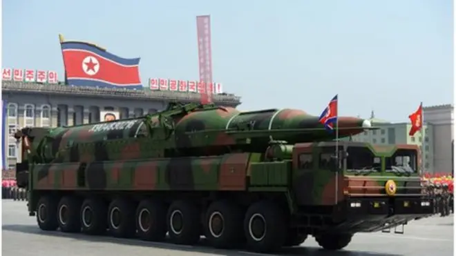 This file photo taken on April 15, 2012 shows a military vehicle carrying what is believed to be a Taepodong-class missile