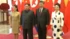 Chinese TV showed footage of the two leaders with their wives