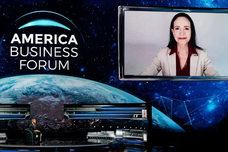 María Corina Machado speaking at a business event in Miami