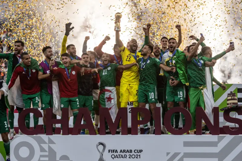 The Algerian national team celebrates the 2021 Arab Cup in Doha