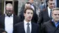 Zuckerber resmi giyimli yanında birkaç adamla birlikte merdivenlerden iniyor gibi görünüyor. 
