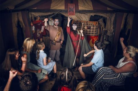 Visitors enjoy a gory scene at the London Bridge Experience