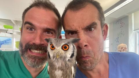 Doctors Chris and Xand pose with an owl in this episode about neck bones.