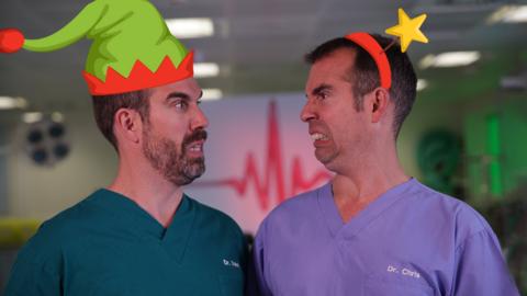 Dr Chris and Dr Xand from Operation Ouch look at each other. Dr Xand wears an animated elf hat. Dr Chris wears an animated Christmas head piece.