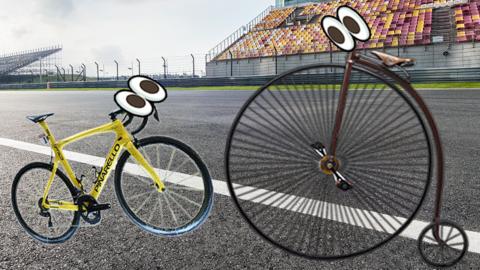 a road racing bike and a penny farthing