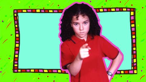 Tracy Beaker pointing at towards the camera