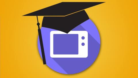 A teacher's mortar board balances on a picture of a television.