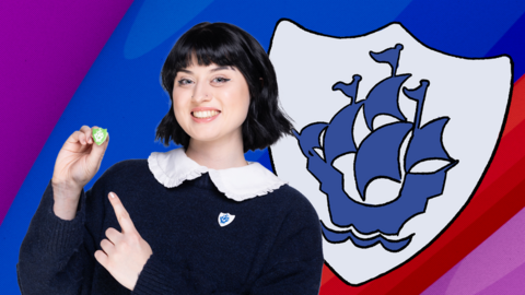 Abby from Blue Peter holding up a Green badge