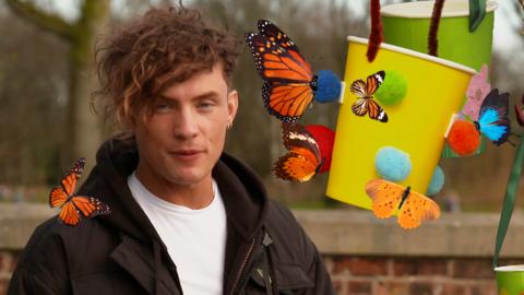 Blue Peter's Joel demonstrates how to build a butterfly feeder.