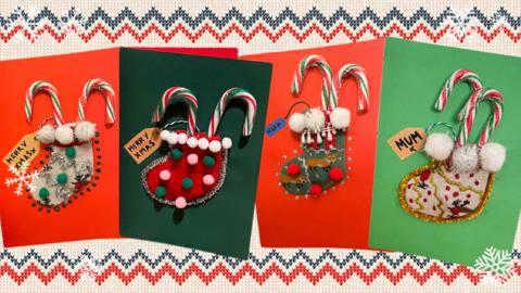 Four Christmas cards on a knitted background.