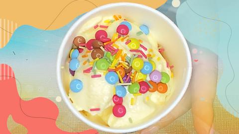 ˿made ice cream with lot of sprinkles.