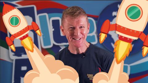 Tim Peake smiling, surrounded by cartoon rockets.