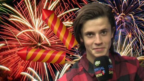 Cel Spellman in front of some fireworks.