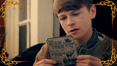 A victorian boy looking at a leaflet. The boy is from the C鶹ҳ series Hetty Feather.