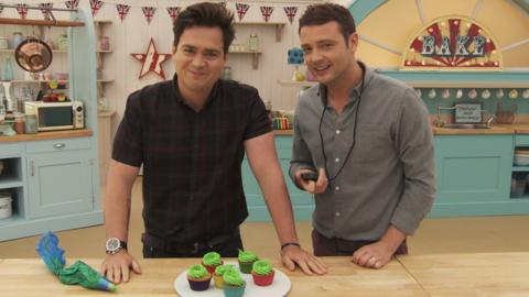 Sam and Mark with decorated cupcakes.