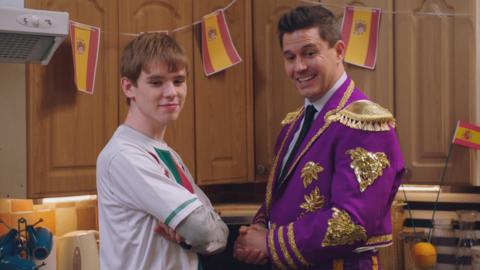 Leo in a portugal t-shirt and Mike in a flamenco outfit.