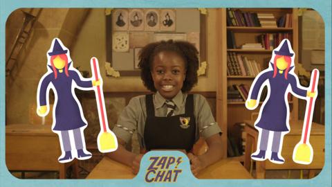 A young witch (Beatrice from The Worst Witch) smiles at the camera with emoji witches on either side of her head holding brooms.