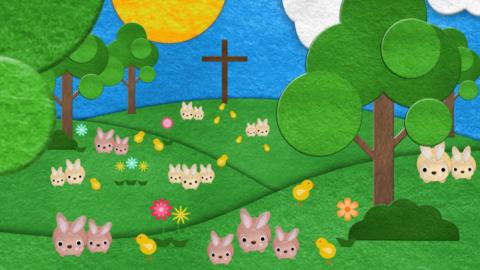 The Cross and rabbits on a green field.