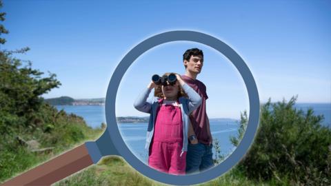 Molly and Mack with binoculars