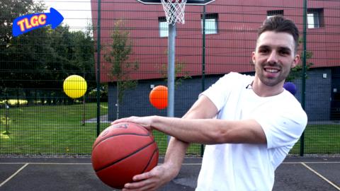 Man holding basketball