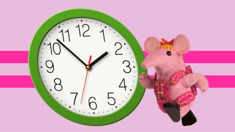 A Clanger and a clock are racing. Two pink racing stripes are behind them.