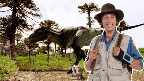 Andy in front of a Tyrannosaurus Rex