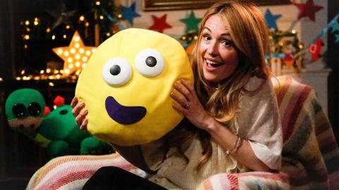 Click to watch Cat Deeley read Love Makes a Family for CBeebies Bedtime Stories.