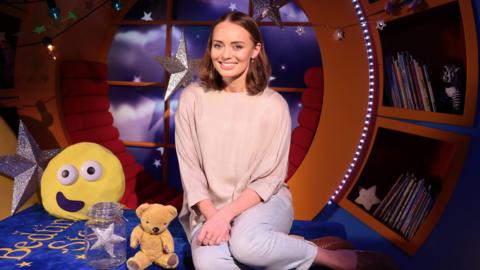 Click to watch Laura Haddock read Star in the Jar for CBeebies Bedtime Stories.