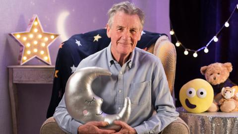 Click to watch Michael Palin read By the Light of the Moon for CBeebies Bedtime Stories.