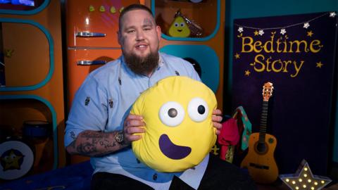 Click to watch Rag 'n' Bone Man read Tell Me A Story, Rory for CBeebies Bedtime Stories.