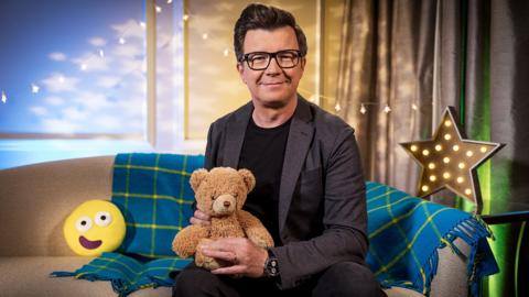 Click to watch Rick Astley read Show and Tell for CBeebies Bedtime Stories.