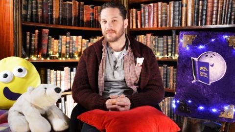 Click to watch Tom Hardy read There's a Bear on My Chair for CBeebies Bedtime Stories.