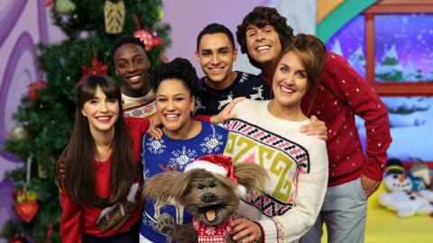 The CBeebies House presenters singing the Christmas song