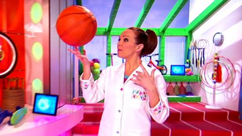 Nina spinning a basketball on her finger